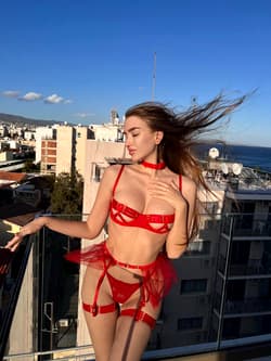 Glamorous OnlyFans babe Teeen Lola poses in her lingerie on the rooftop'